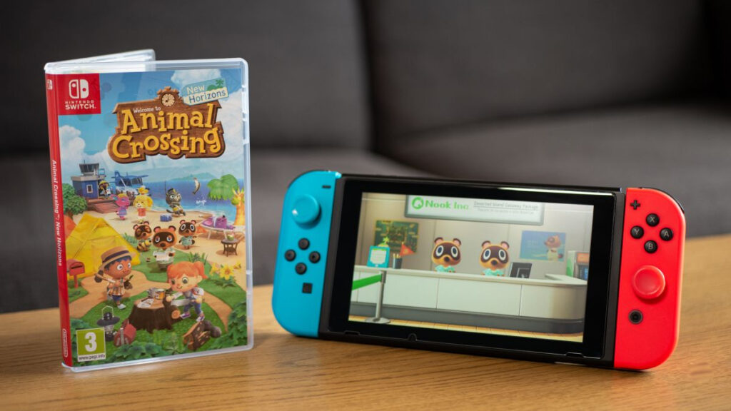 تصویری از کنسول دستی Nintendo Switch به همراه بازی Animal Crossing